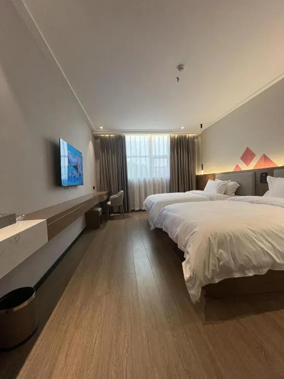 Bed in Borrman Hotel Nanning Anji Passenger Station Xijin Metro Station