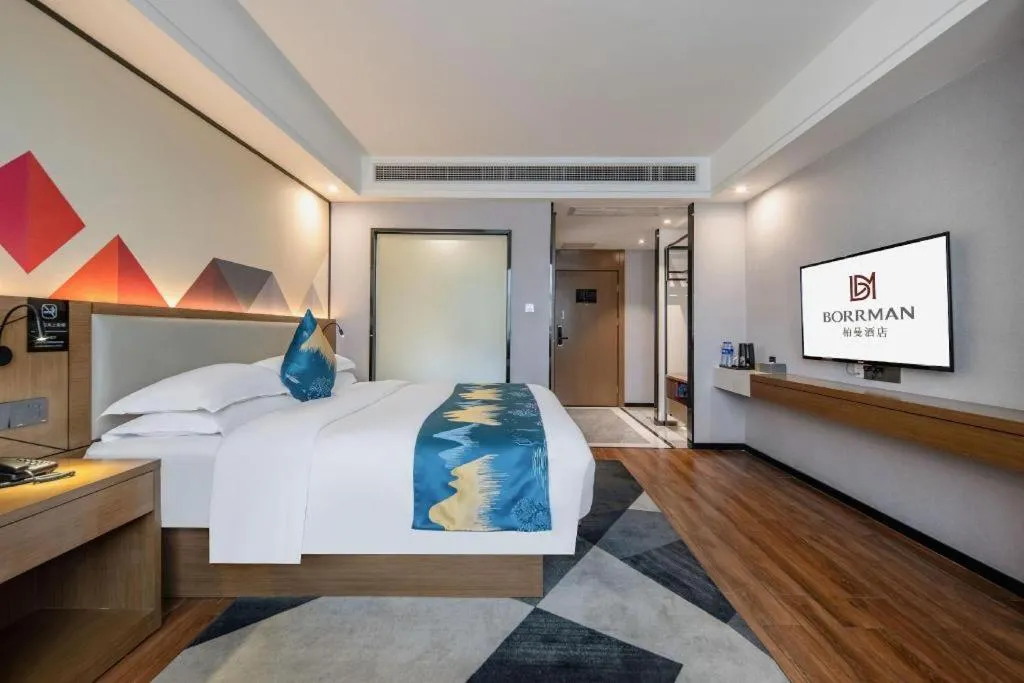 Bed in Borrman Hotel Nanning Anji Passenger Station Xijin Metro Station
