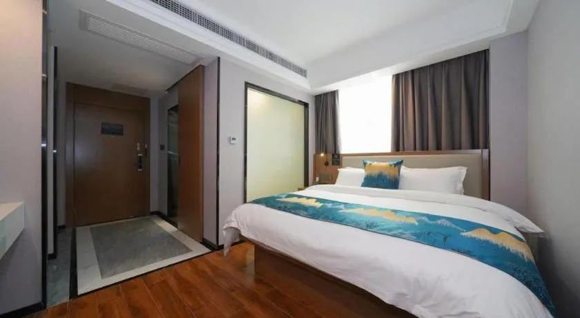 Bed in Borrman Hotel Nanning Anji Passenger Station Xijin Metro Station