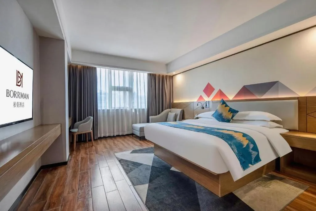 Bed in Borrman Hotel Nanning Anji Passenger Station Xijin Metro Station