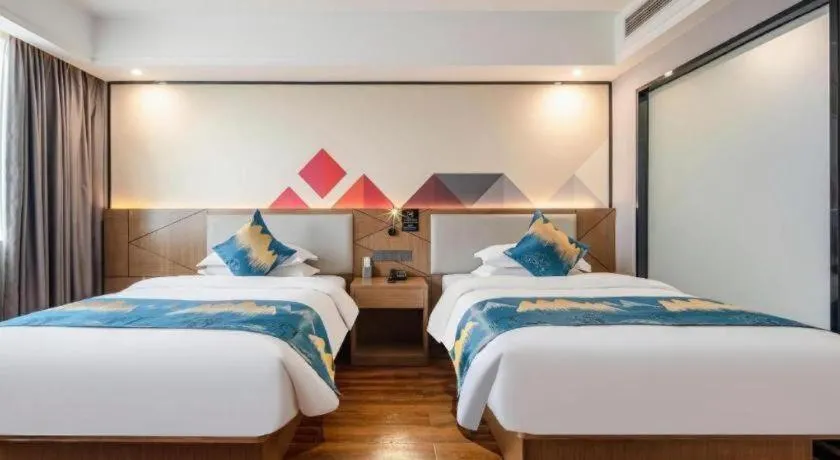 Bed in Borrman Hotel Nanning Anji Passenger Station Xijin Metro Station