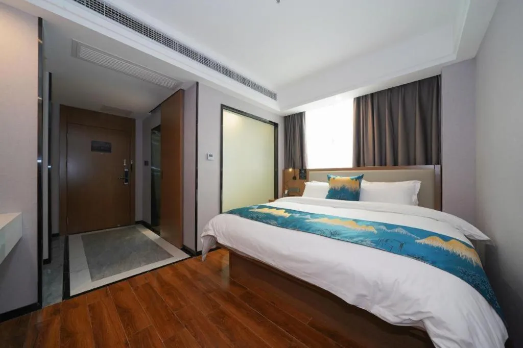 Bed in Borrman Hotel Nanning Anji Passenger Station Xijin Metro Station