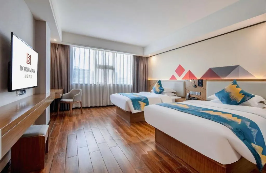 Bed in Borrman Hotel Nanning Anji Passenger Station Xijin Metro Station