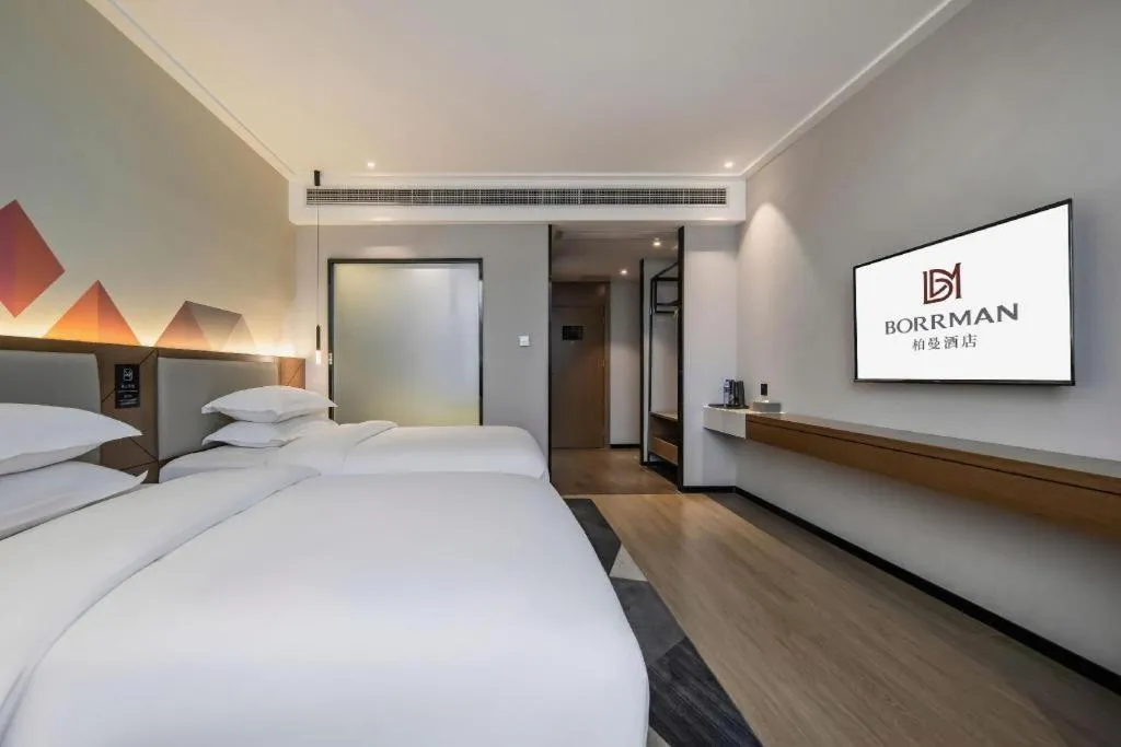 Bed in Borrman Hotel Nanning Anji Passenger Station Xijin Metro Station