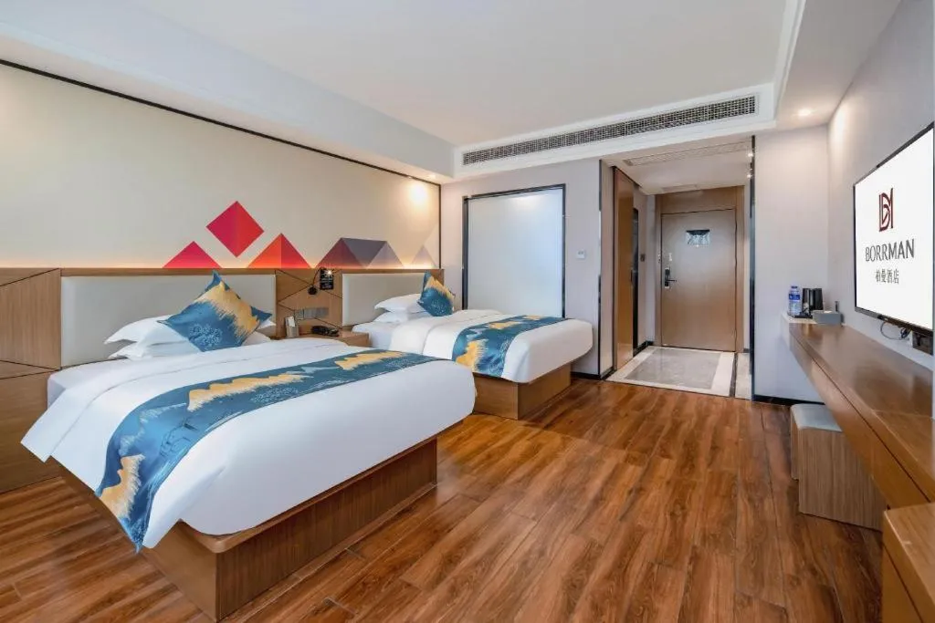 Bed in Borrman Hotel Nanning Anji Passenger Station Xijin Metro Station