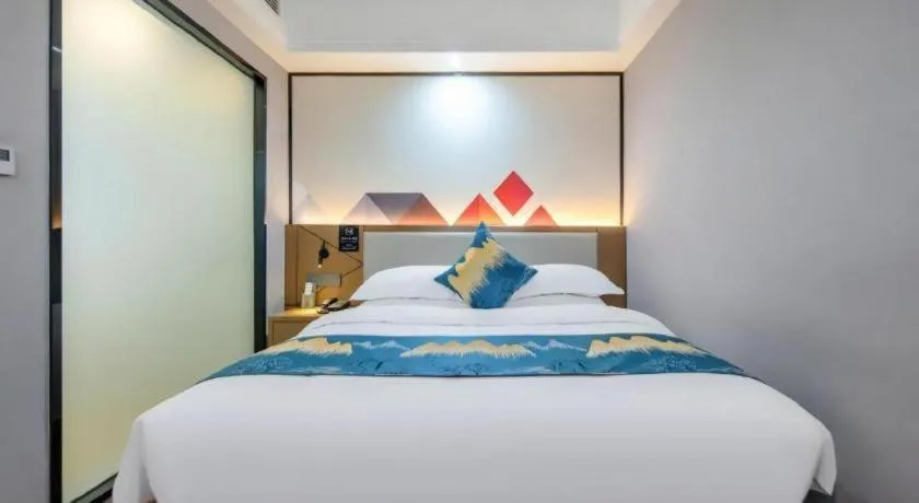 Bed in Borrman Hotel Nanning Anji Passenger Station Xijin Metro Station