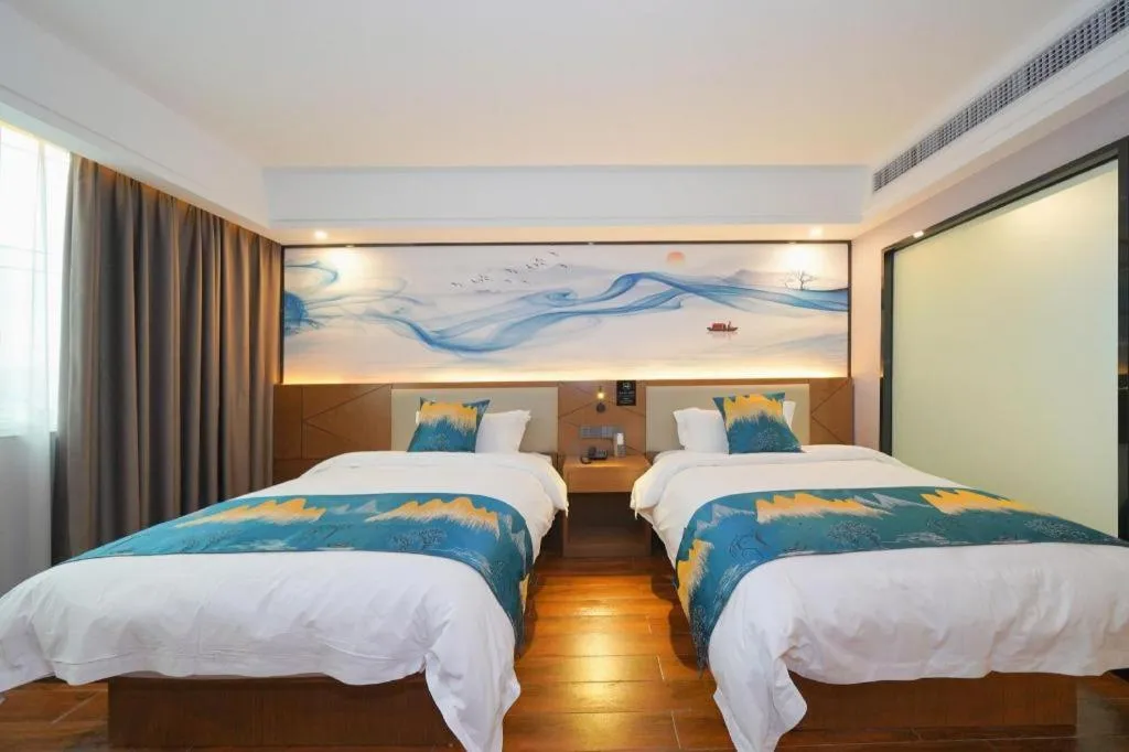 Bed in Borrman Hotel Nanning Anji Passenger Station Xijin Metro Station