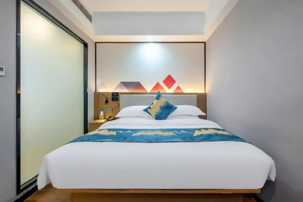 Bed in Borrman Hotel Nanning Anji Passenger Station Xijin Metro Station