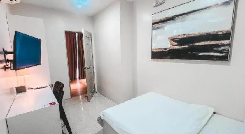 Bed in LAVERO SUITES