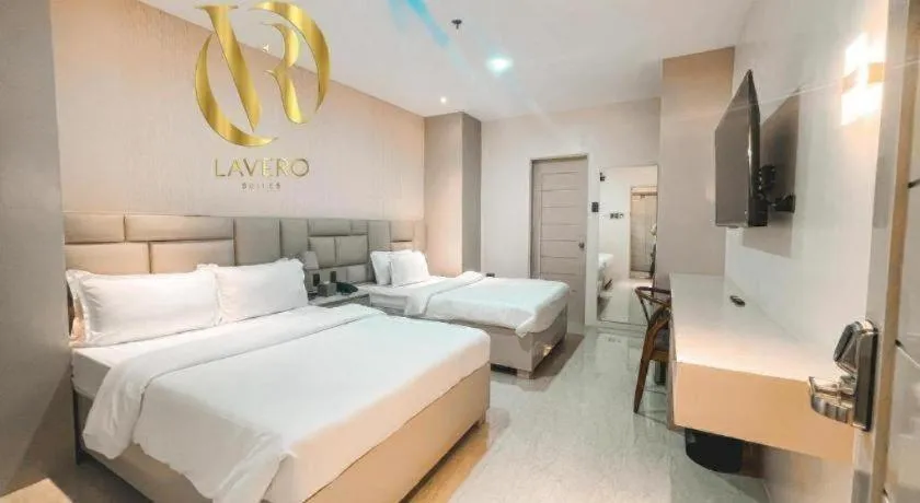 Bed in LAVERO SUITES