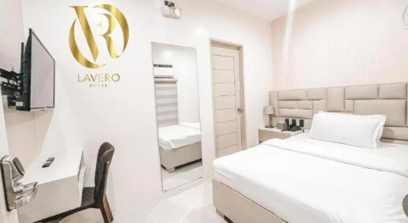 Bed in LAVERO SUITES