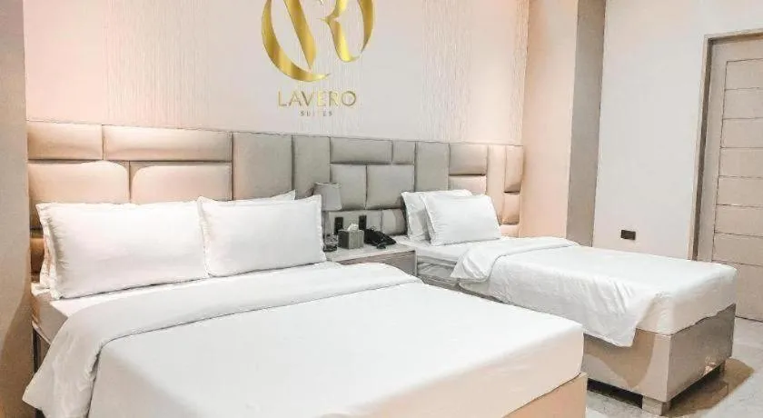 Bed in LAVERO SUITES