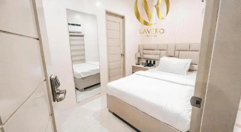 Bed in LAVERO SUITES