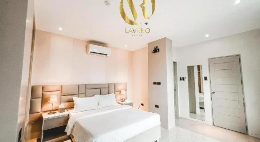 Bed in LAVERO SUITES