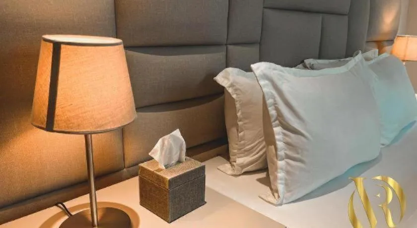 Bed in LAVERO SUITES