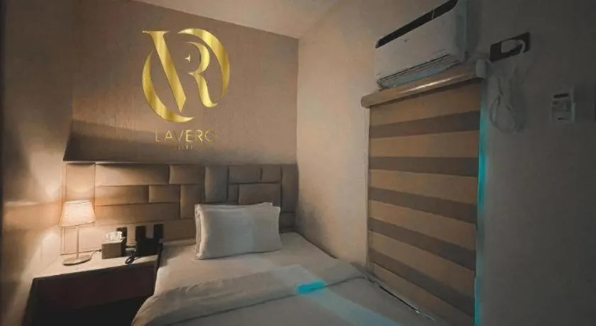 Bed in LAVERO SUITES