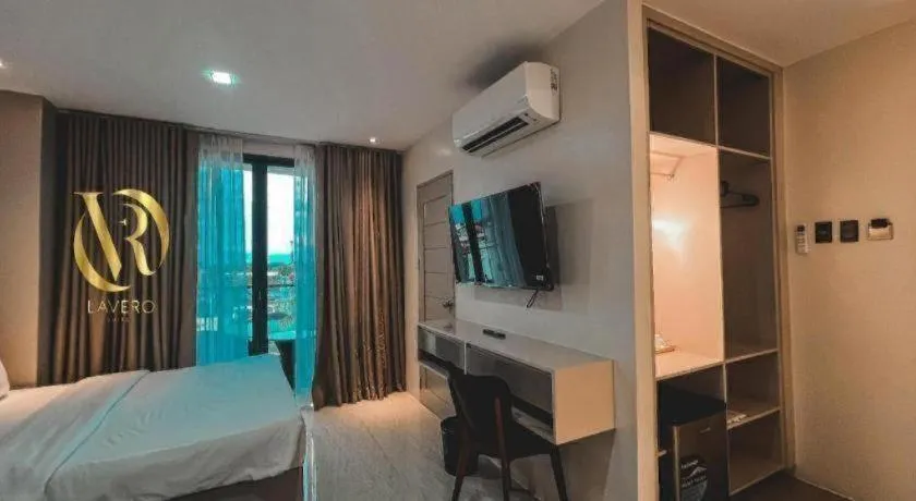 Bed in LAVERO SUITES