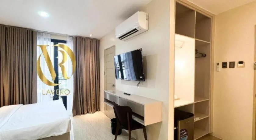 Bed in LAVERO SUITES