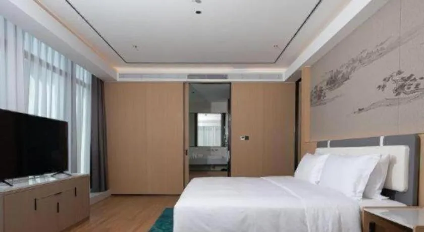 Bed in Ramada Encore by Wyndham Jinan Shanghe