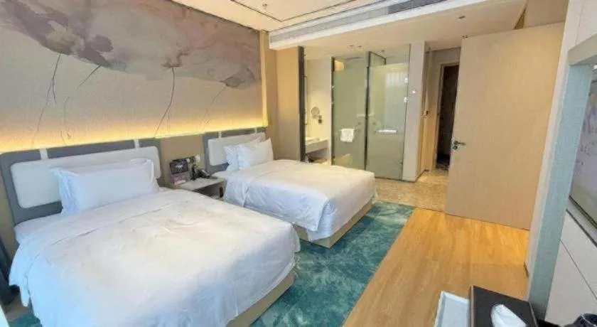 Bed in Ramada Encore by Wyndham Jinan Shanghe