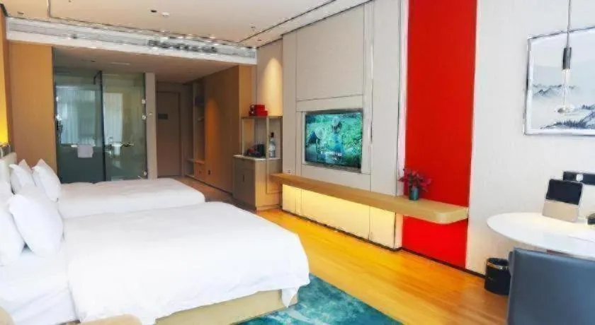 Bed in Ramada Encore by Wyndham Jinan Shanghe