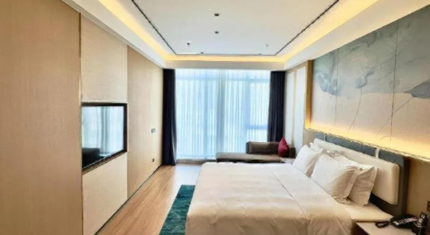 Bed in Ramada Encore by Wyndham Jinan Shanghe