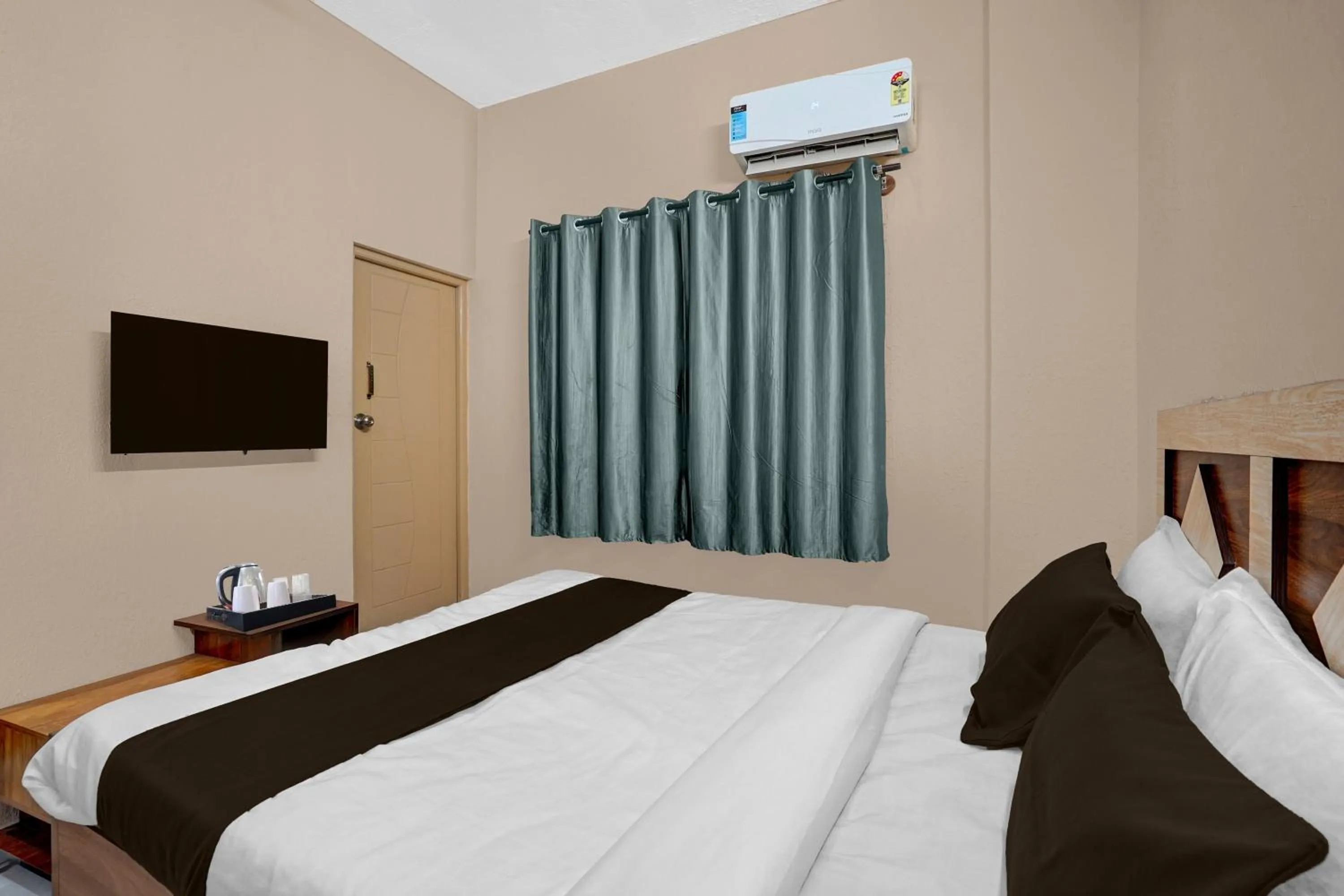 Bedroom, Bed in Super Hotel O Diamond Street Bangalore Formerly Sri Sai Guru Comfort