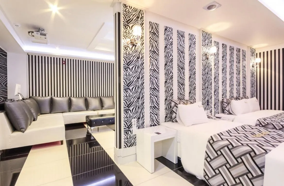 Bed in Gentleman Hotel