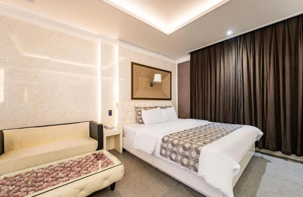 Bed in Gentleman Hotel