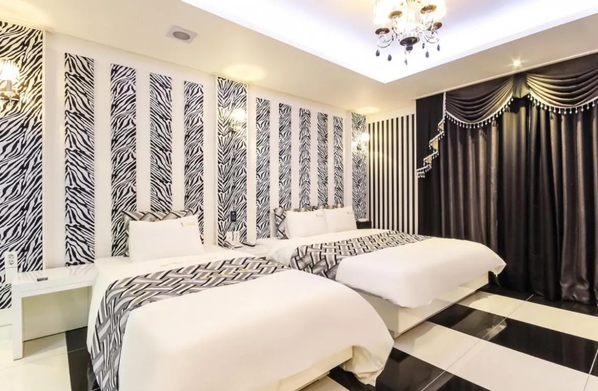 Bed in Gentleman Hotel