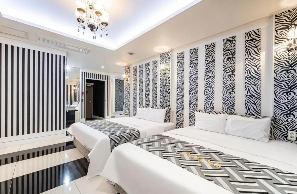 Bed in Gentleman Hotel