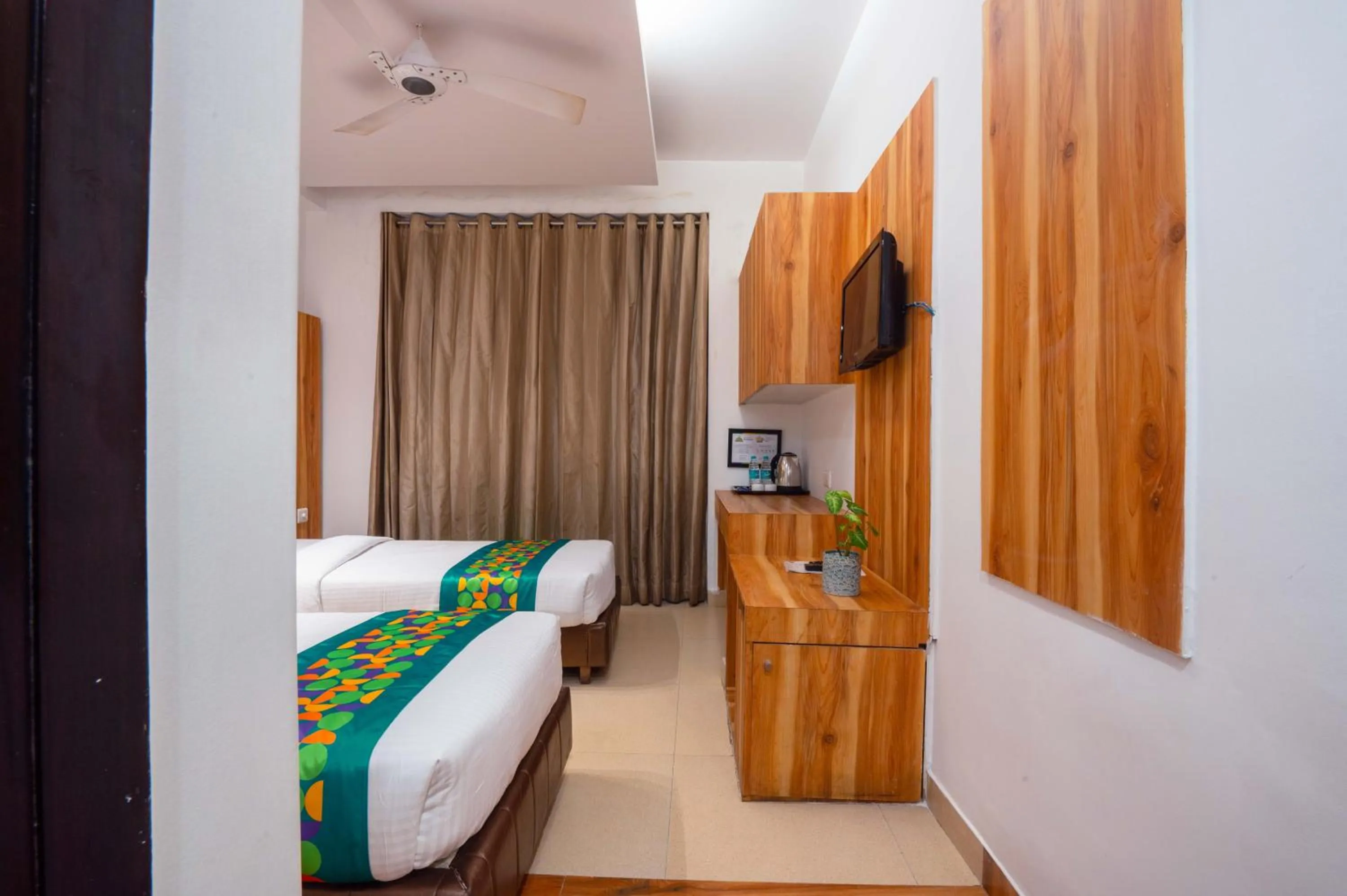 Bedroom, Bed in Treebo Twin Tree