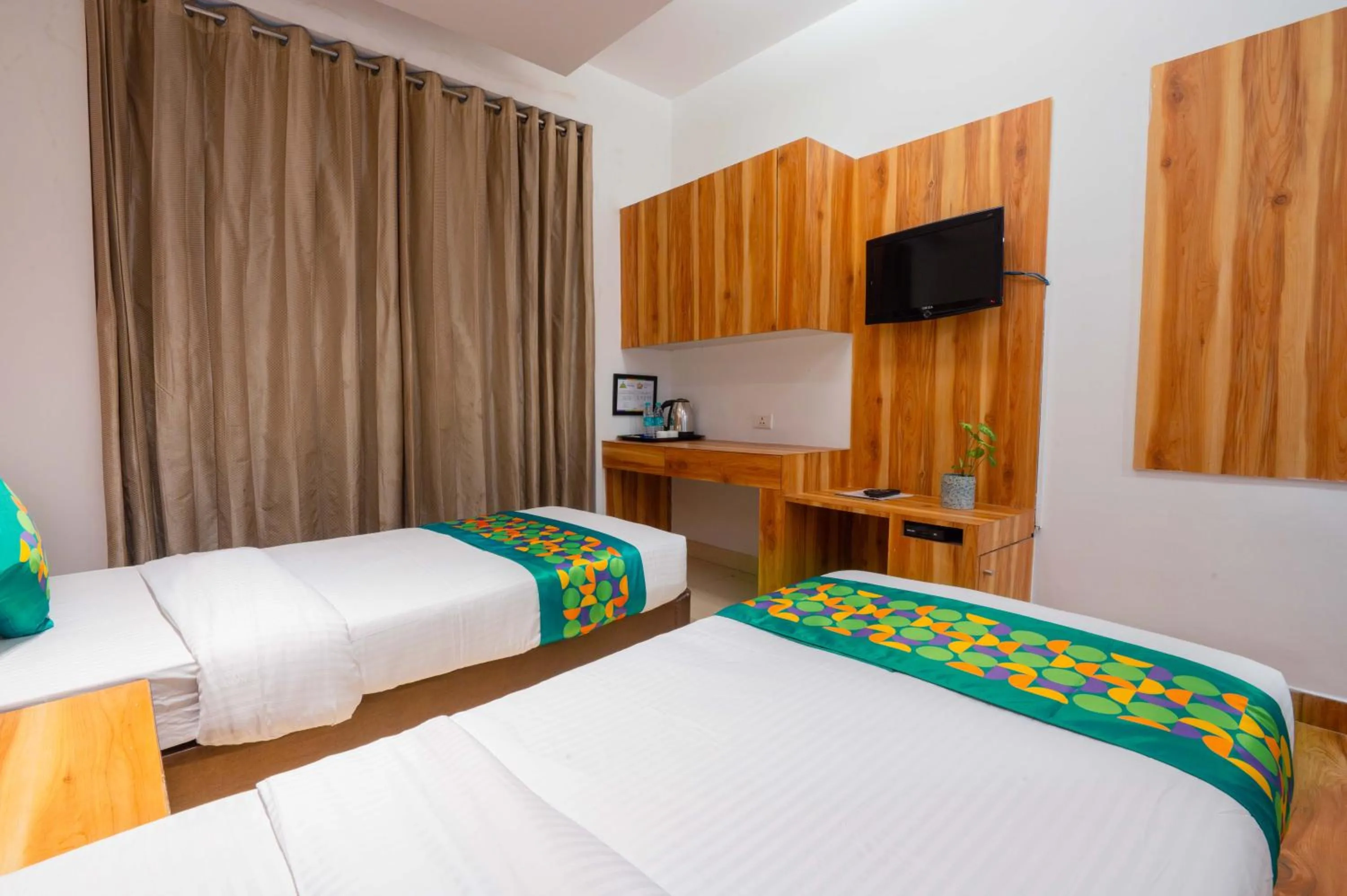 Bedroom, Bed in Treebo Twin Tree