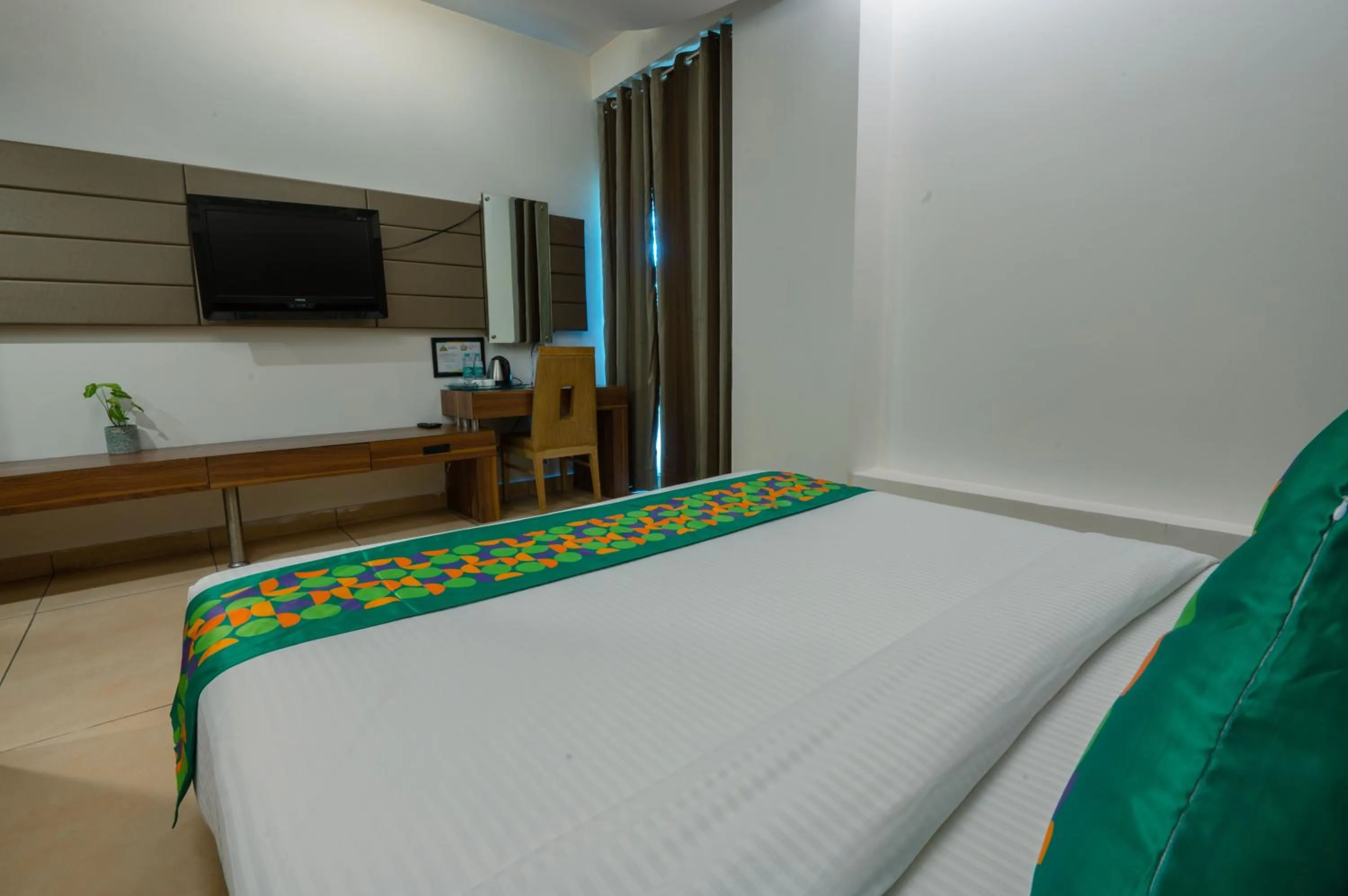 Bedroom, Bed in Treebo Twin Tree