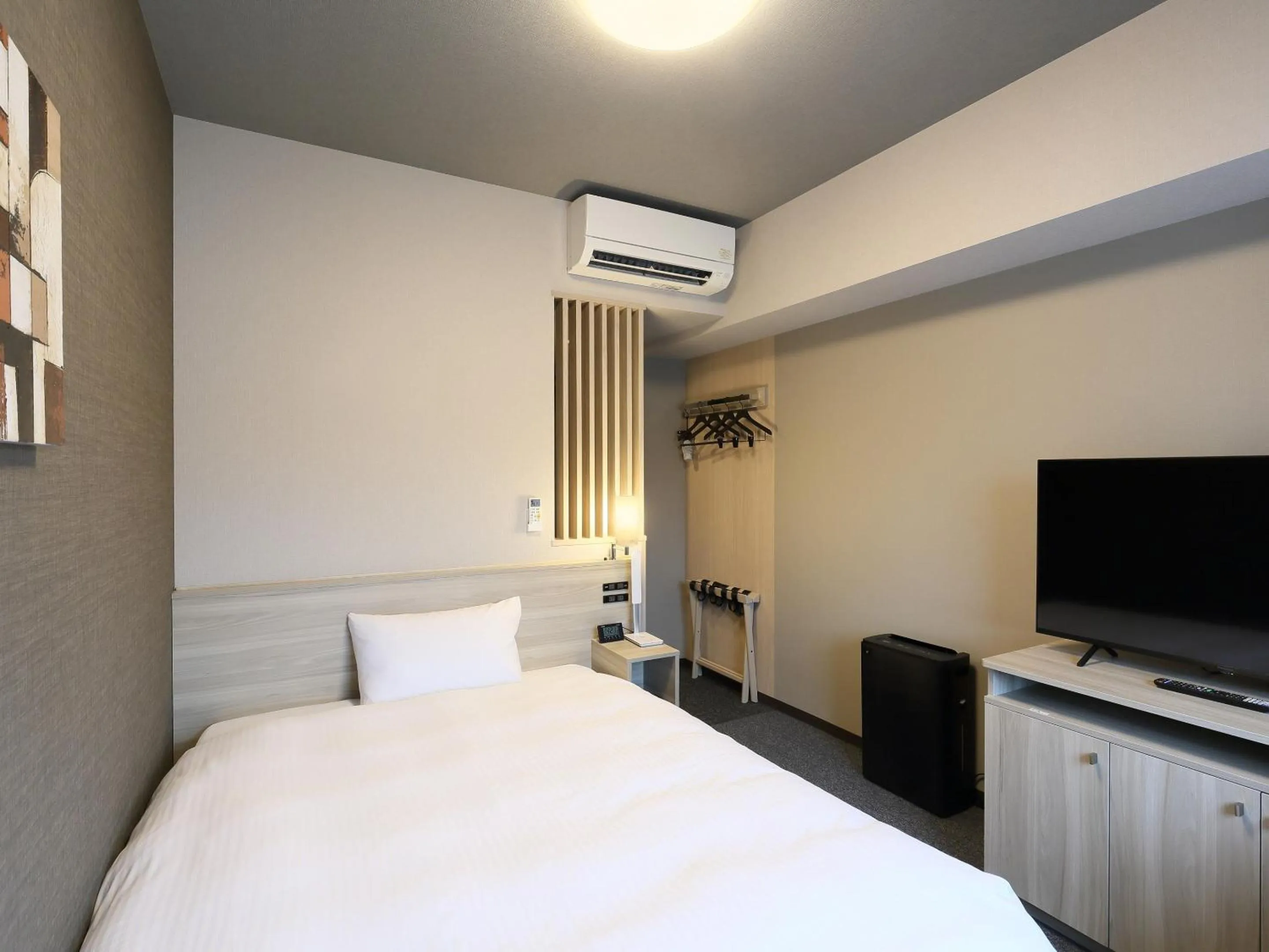 Photo of the whole room, Bed in Hotel Route Inn Grand Kainan Ekimae