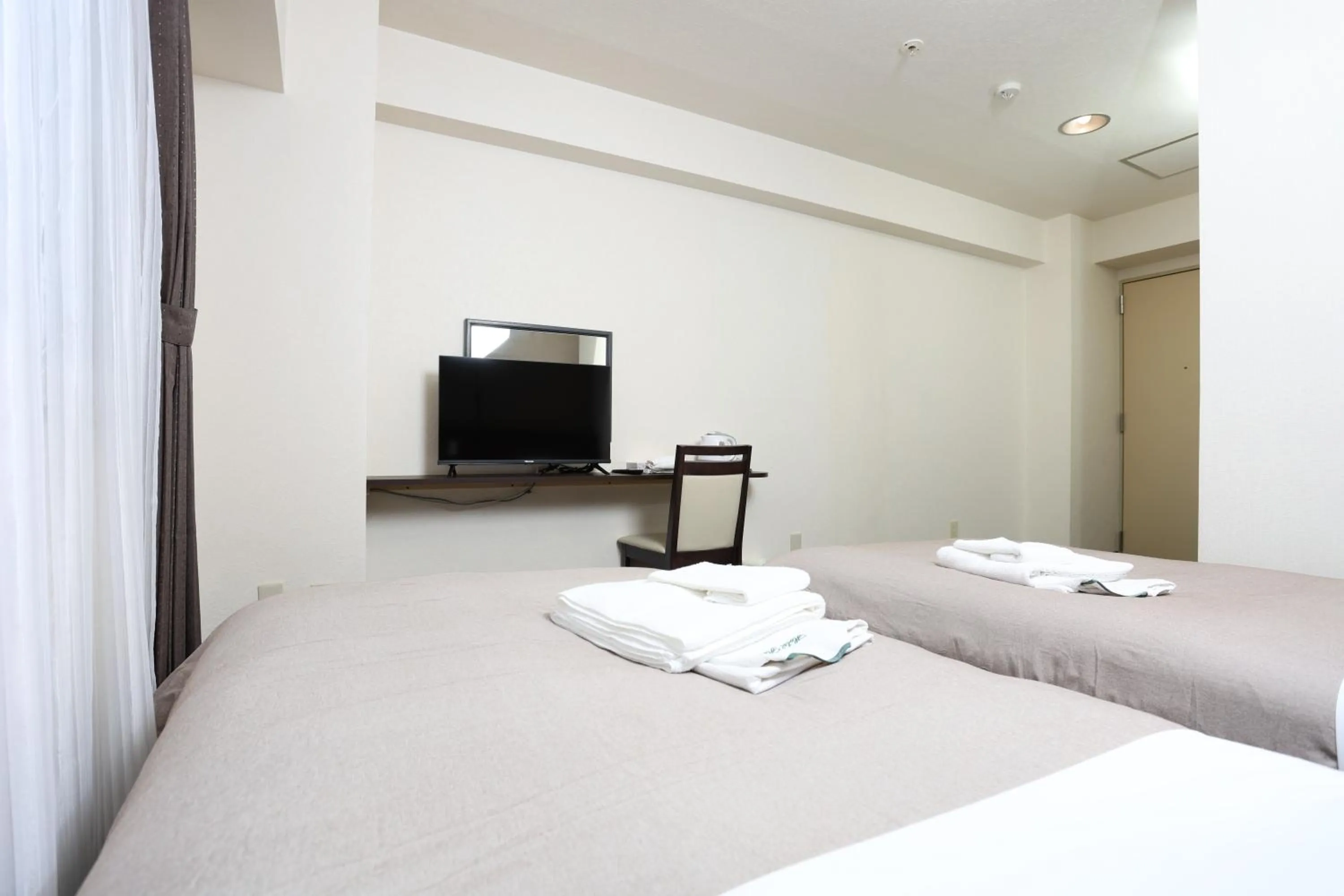 Bed in Sapporo Oriental Hotel