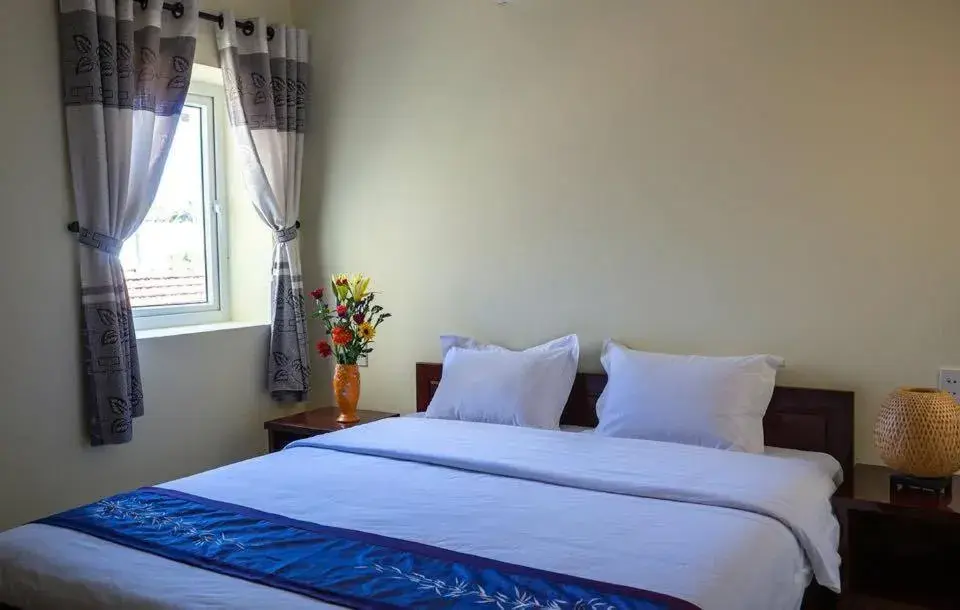 Deluxe Queen Room in Harmony Hoian Homestay Deluxe Queen Room in Harmony Hoian Homestay