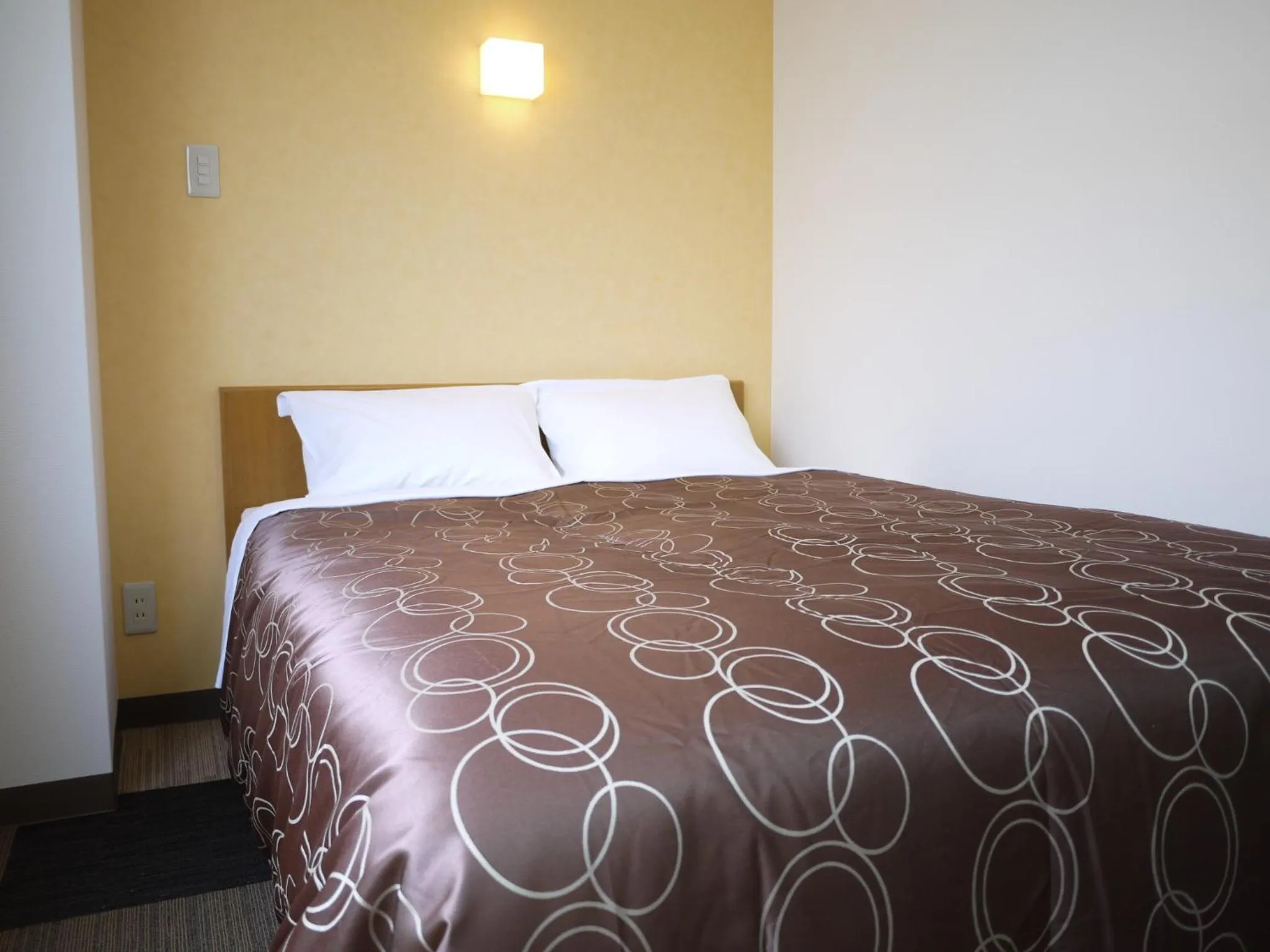 Decorative detail, Bed in Hotel Select Inn Shikoku Chuo