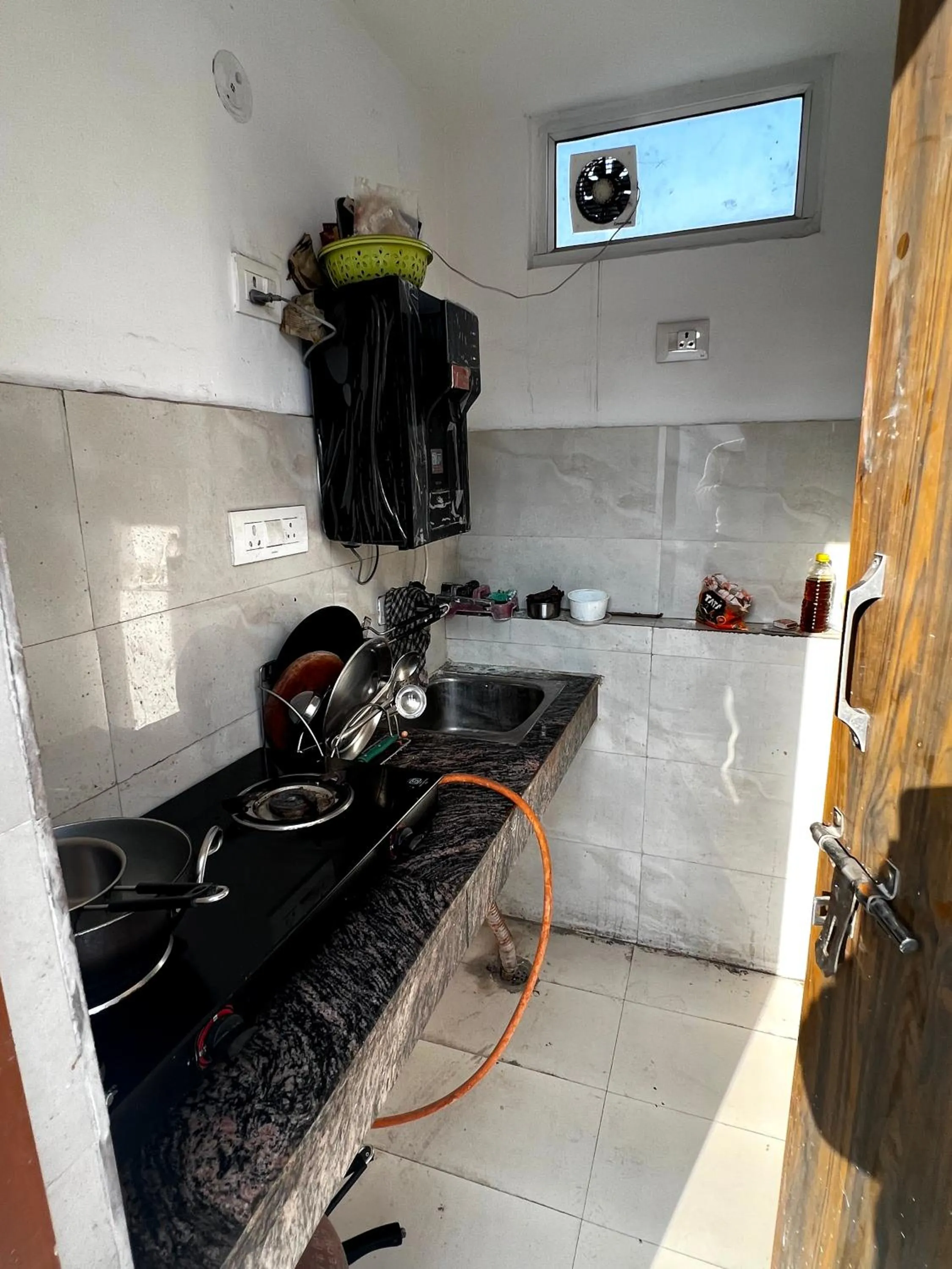 Kitchen or kitchenette in Hotel Trending Stay