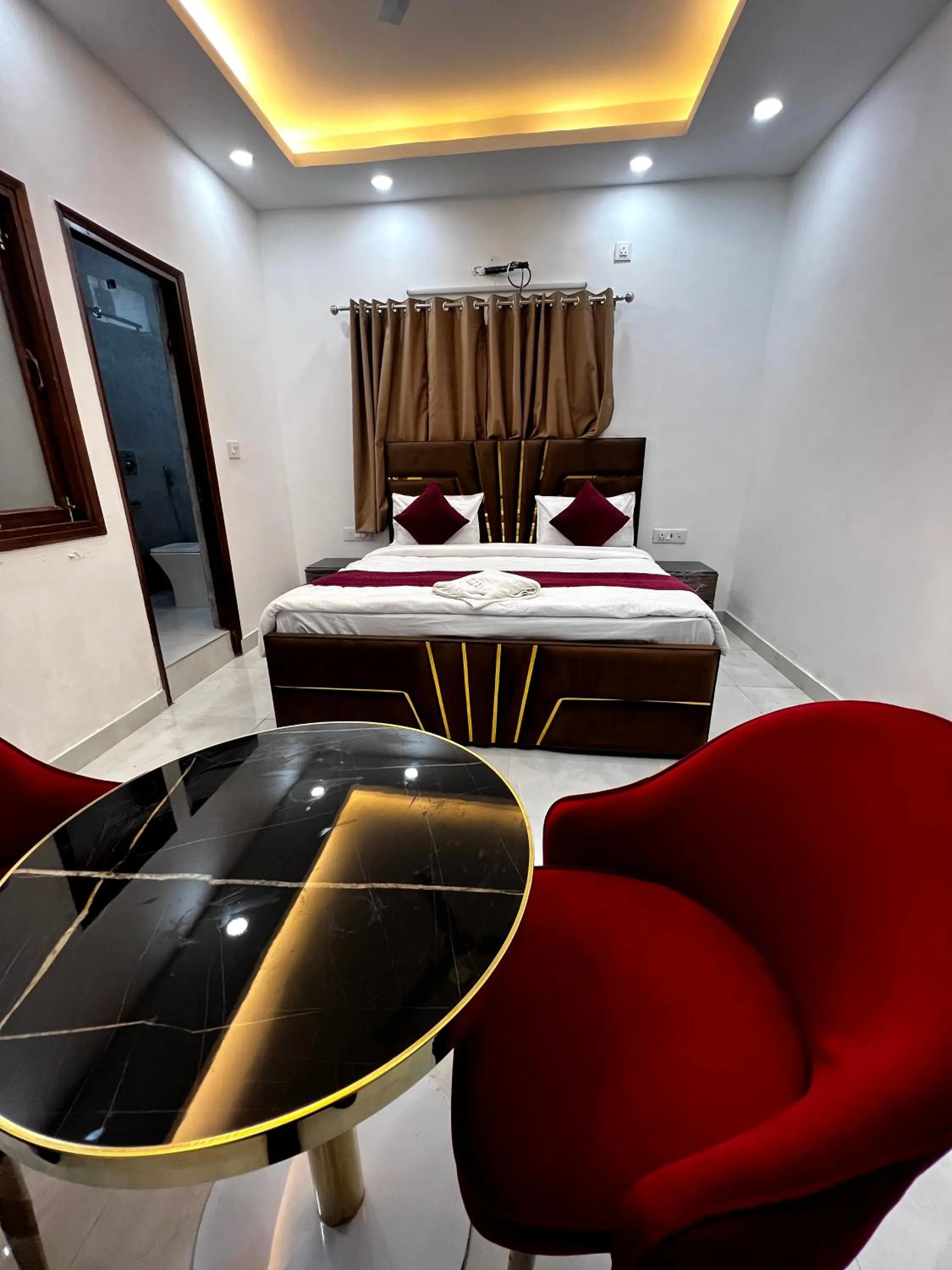 Photo of the whole room, Bed in Hotel Trending Stay