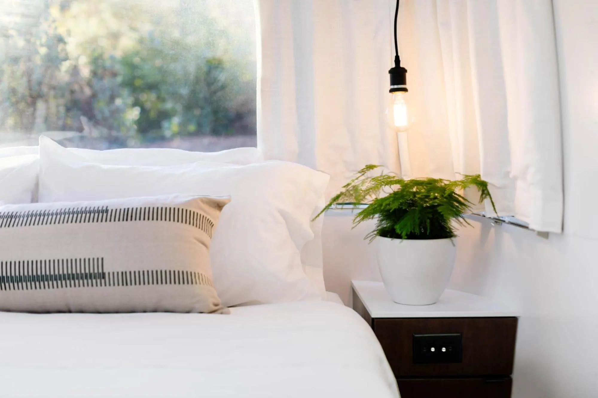 Bed in AutoCamp Sequoia