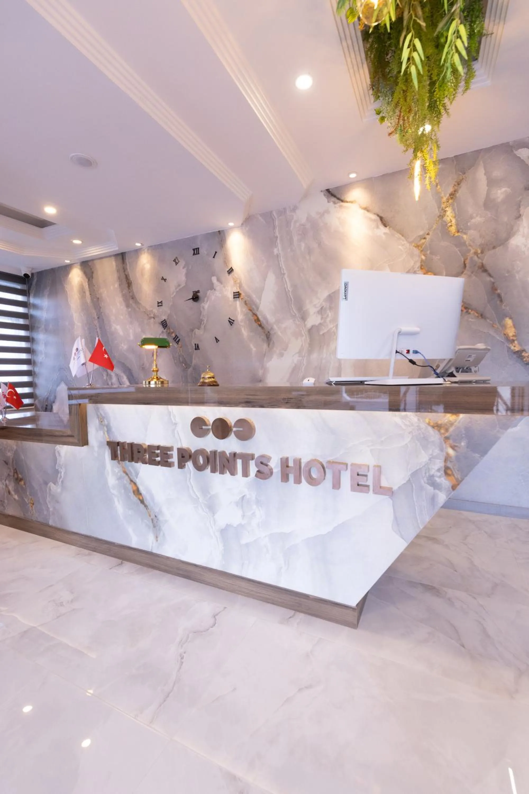 Property logo or sign in Three Points Hotel