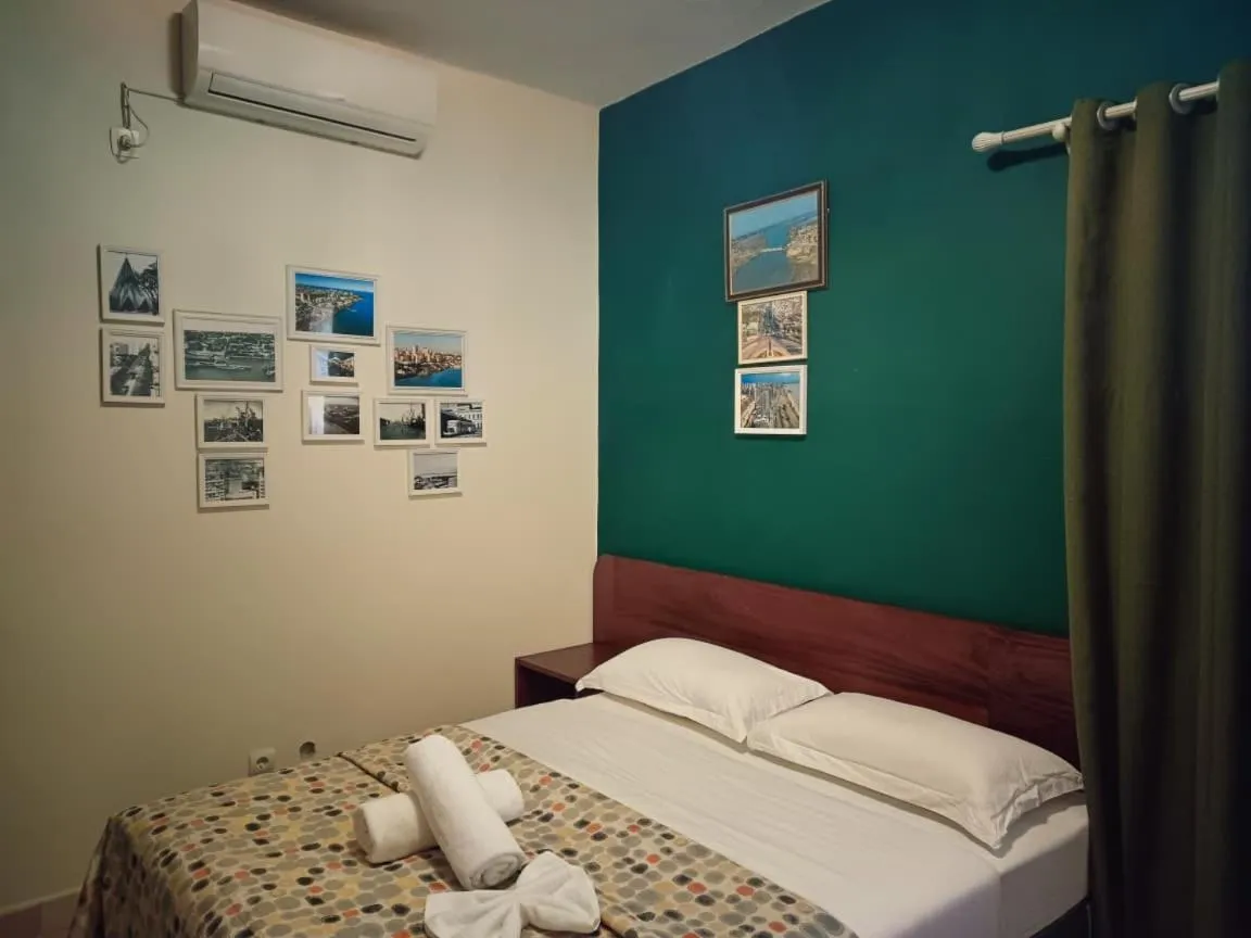 Bed in Hotel Bom Amigo