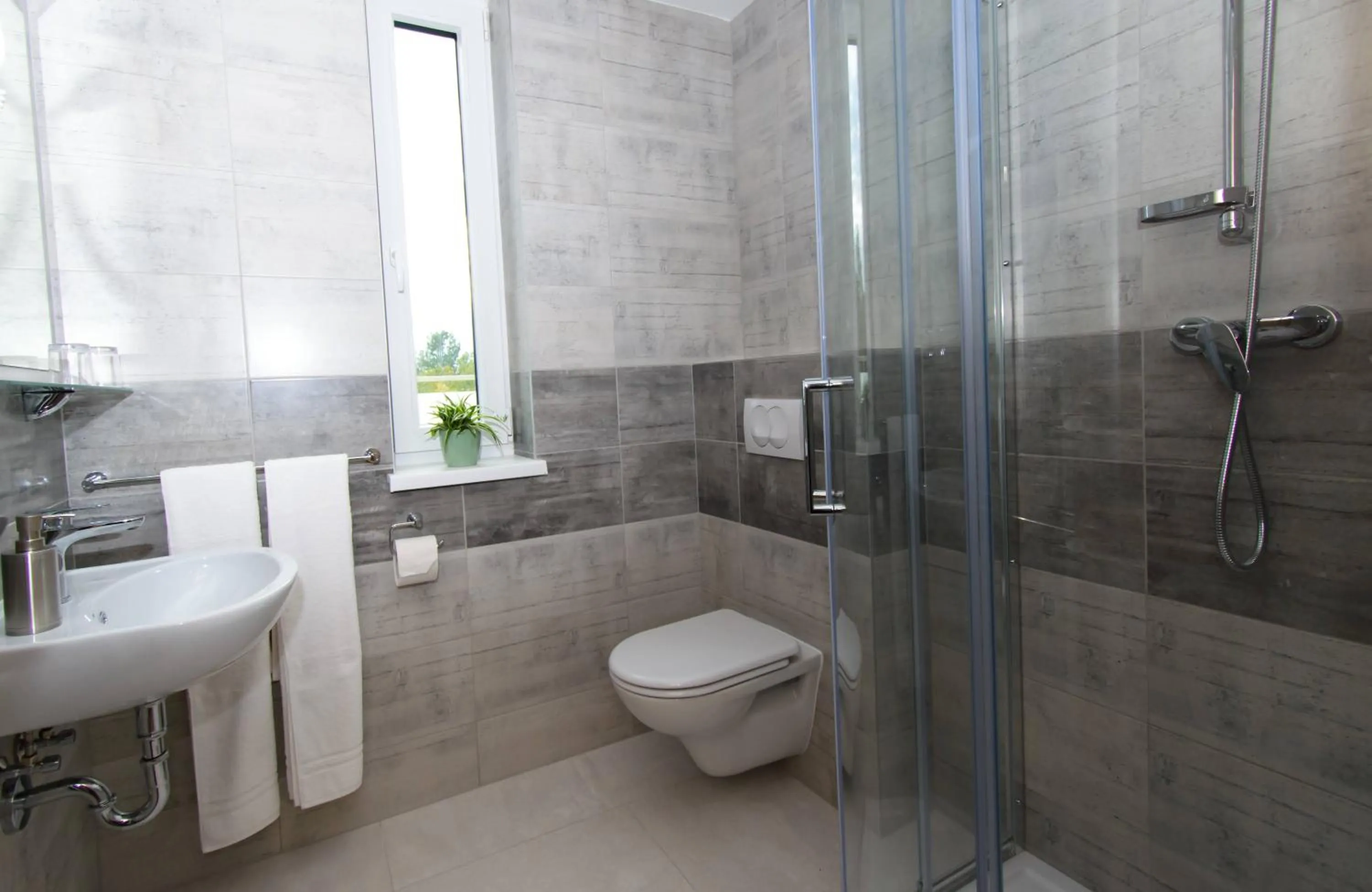 Toilet in Solid Gold Garni Hotel