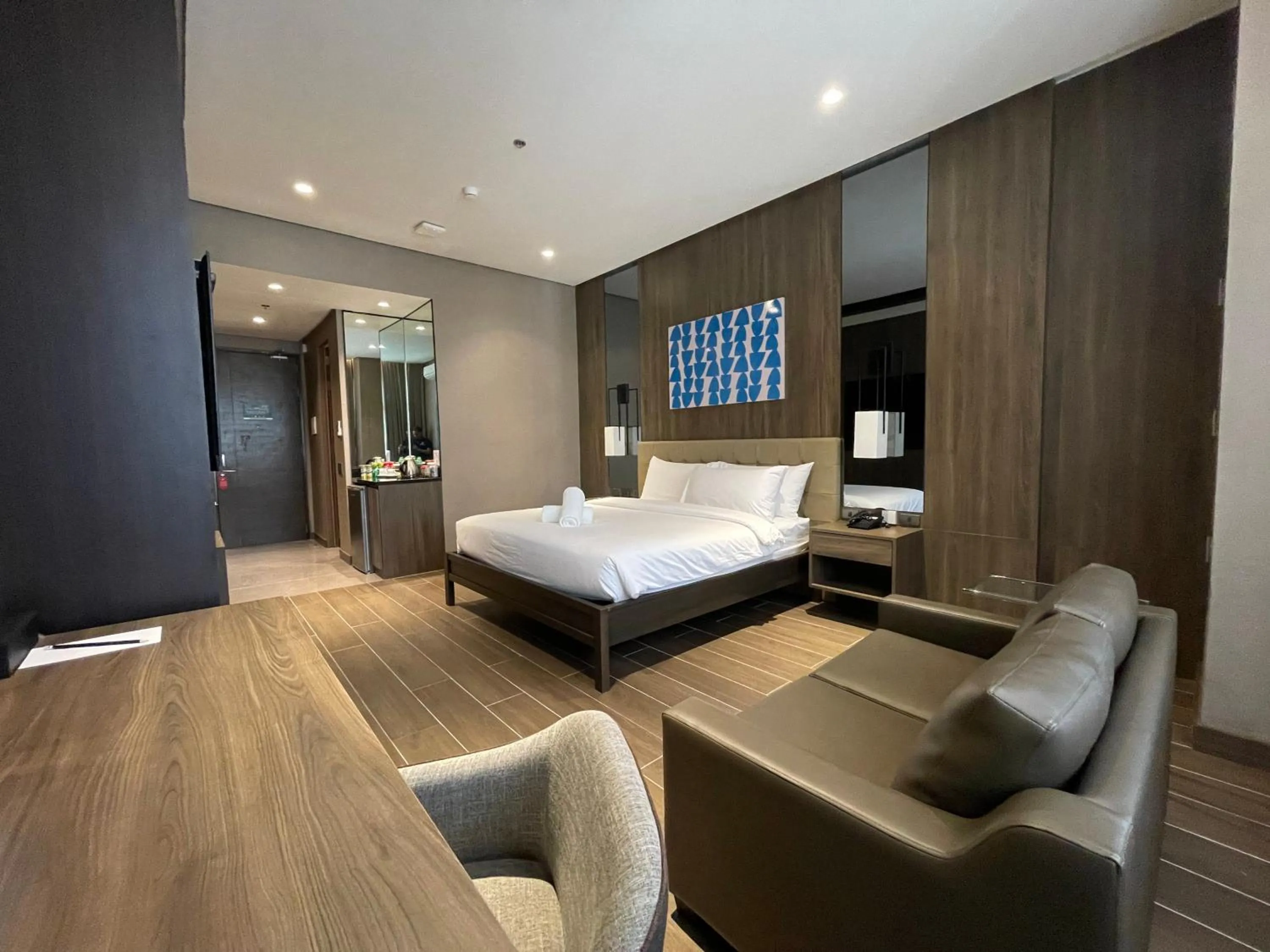 Photo of the whole room, Bed in Hotel A and A Quezon City powered by Cocotel