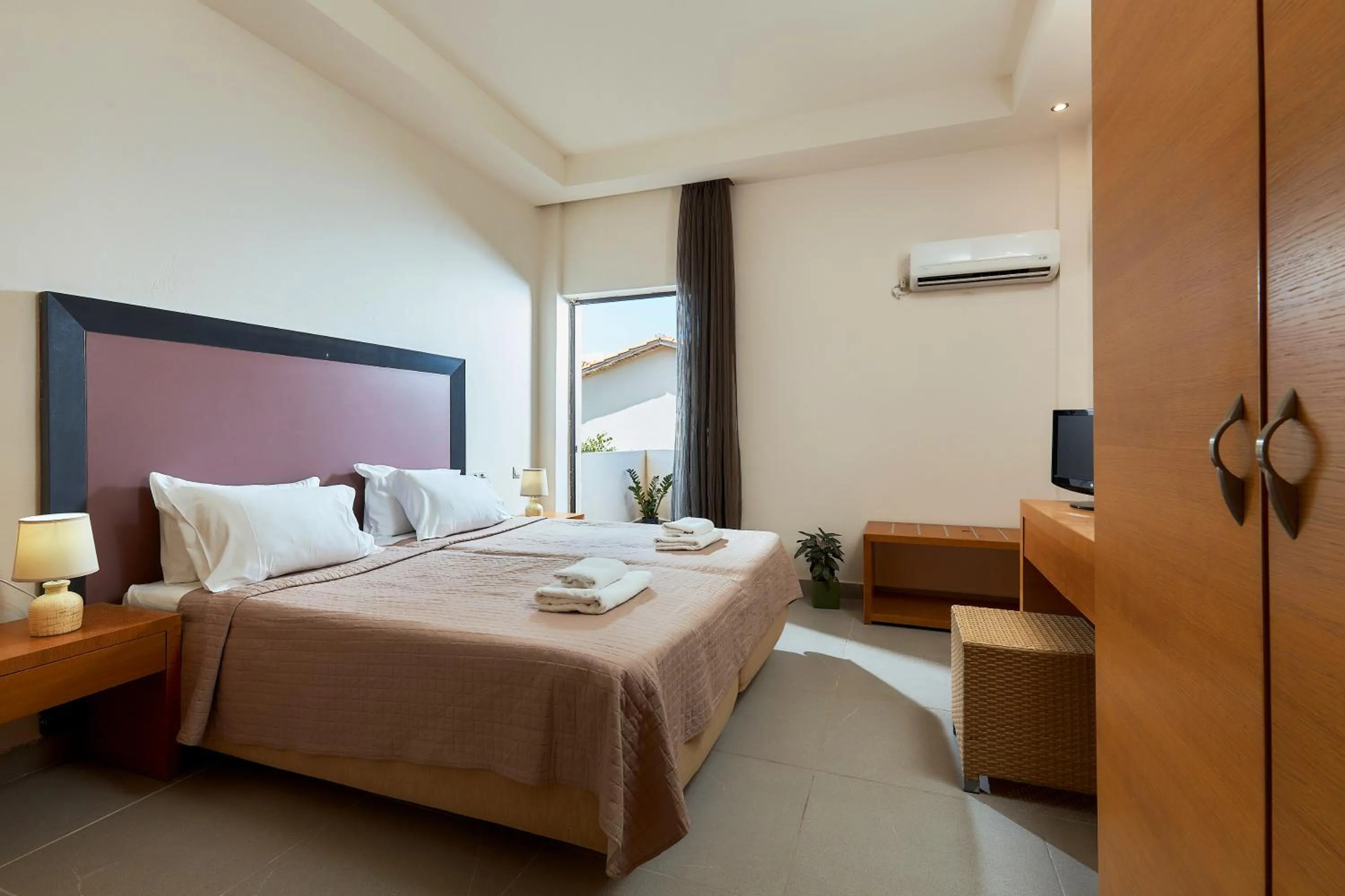 Bedroom, Bed in Creteco Hotel & Suites