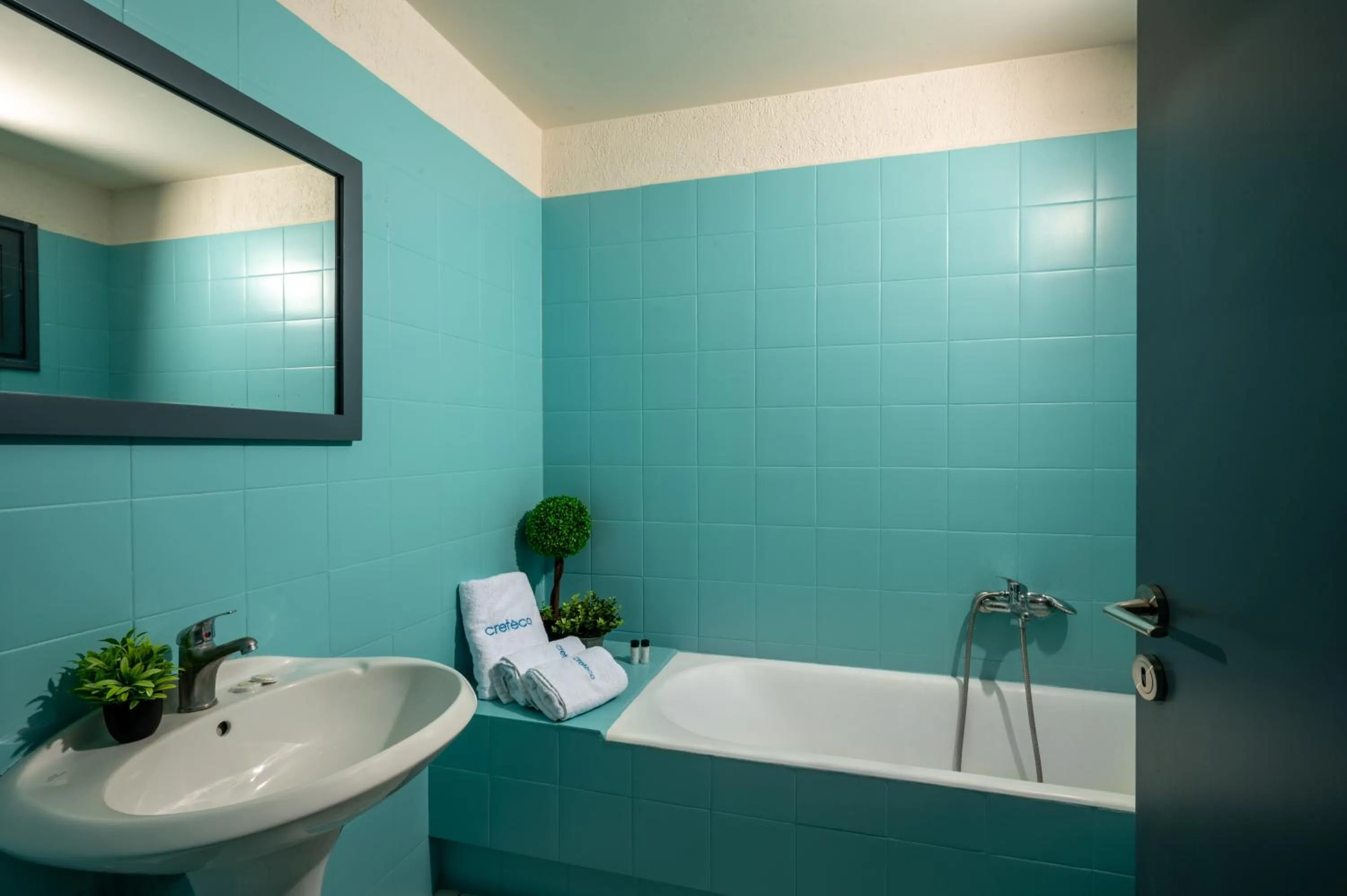 Bathroom in Creteco Hotel & Suites