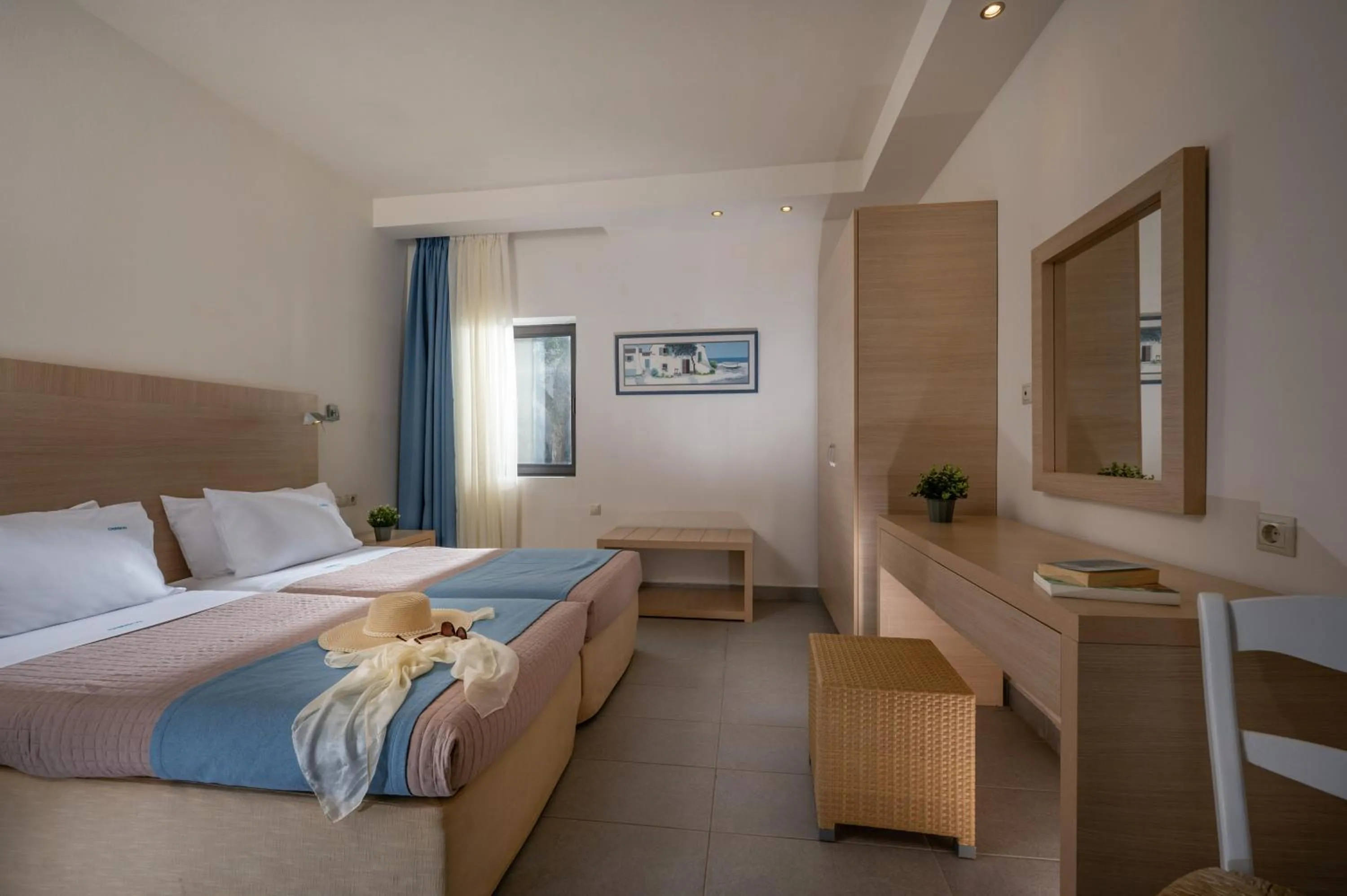 Bed in Creteco Hotel & Suites