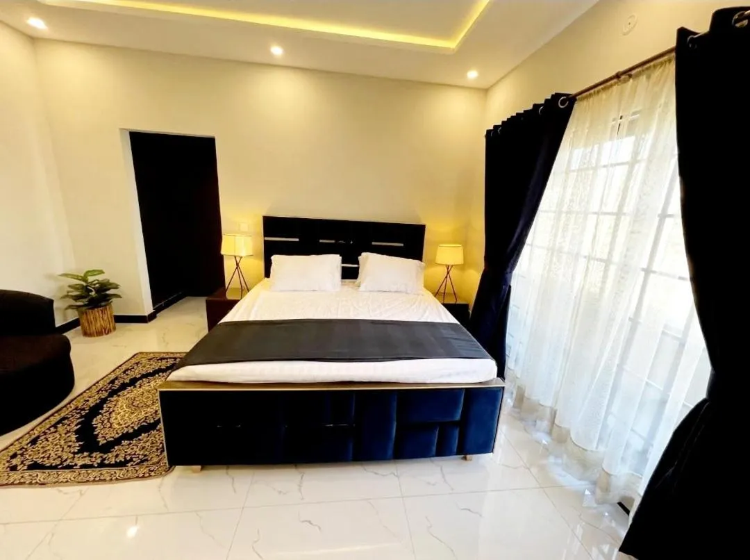 Bed in Riwayat Guest House
