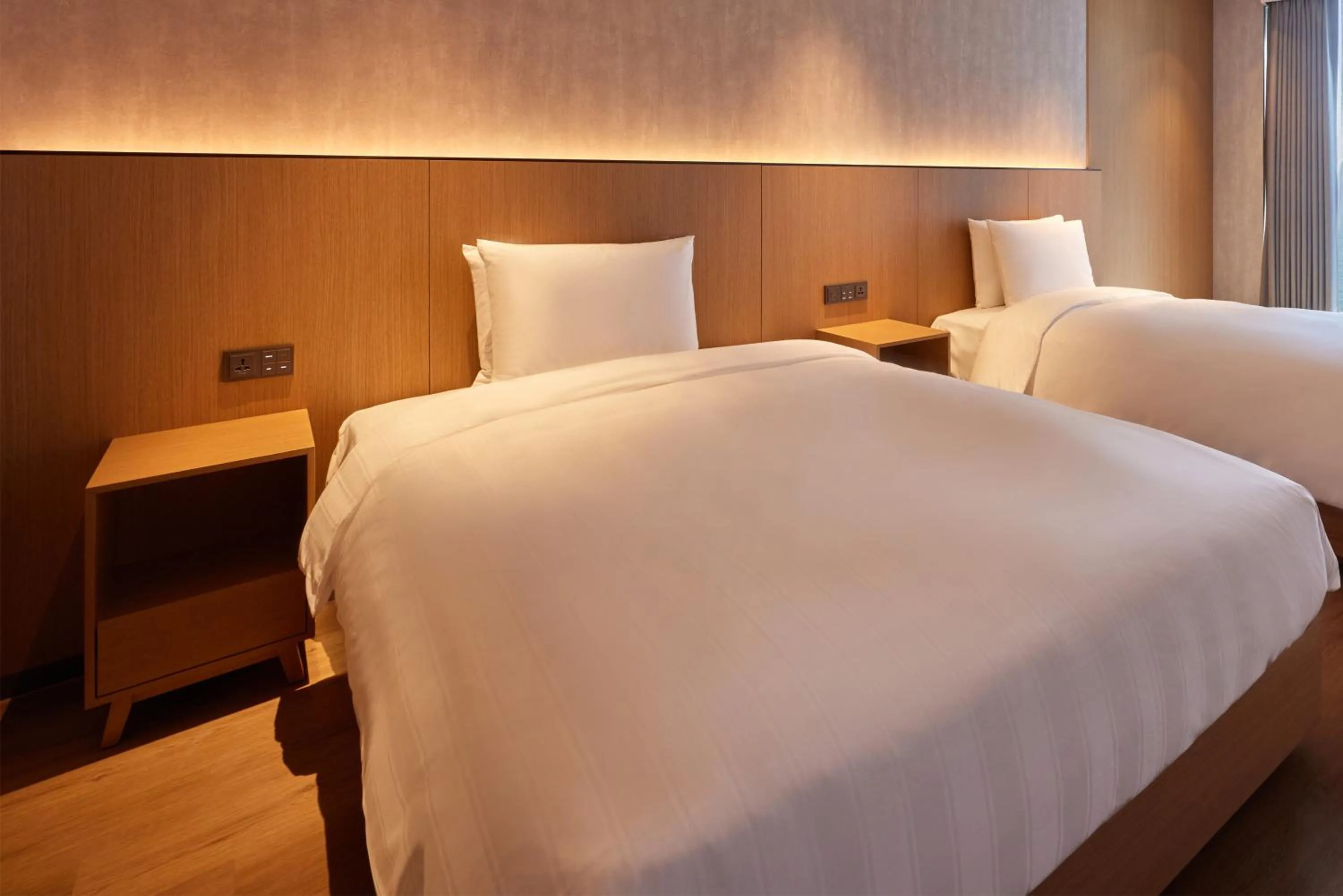 Bed in L7 HAEUNDAE by LOTTE HOTELS
